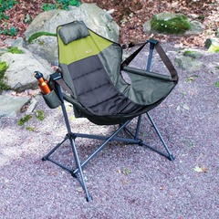 Swing chair with water bottle in cup holder on campground