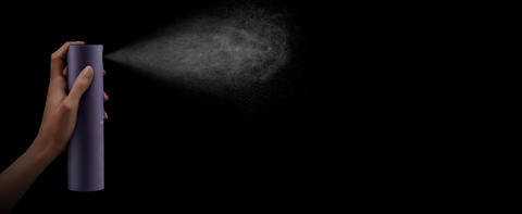 Dyson Chitosan Multi-use styling spray dispenses a fine mist.