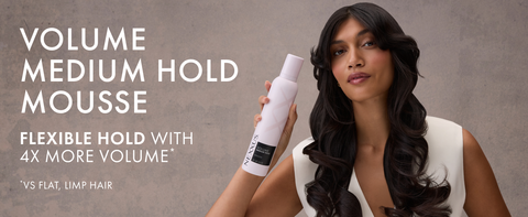 Woman with wavy hair holding a Nexxus bottle next to text highlighting product benefits.