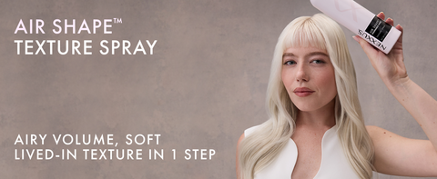 Fancy blond woman with long hair holding a Nexxus Air Shape Texture Spray next to text.