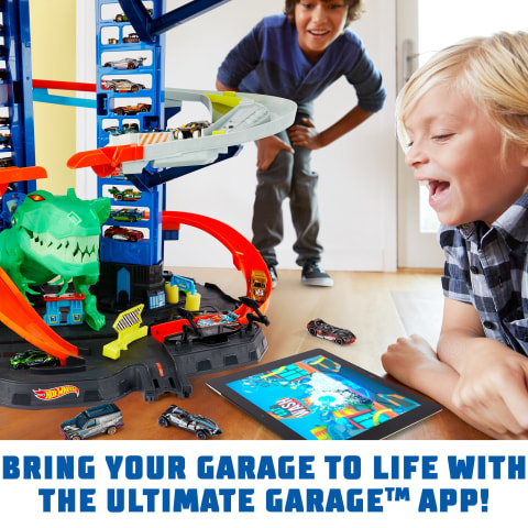  Hot Wheels Ultimate Garage Track Set with 2 Toy Cars, Hot Wheels  City Playset with Multi-Level Side-by-Side Racetrack, Moving T-Rex Dino & Hot  Wheels Storage for 100+ 1:64 Scale ( Exclusive) 