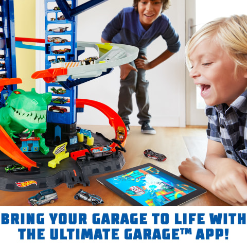 Hot Wheels HW Ultimate Garage Playset with 2 Toy Cars, Stores 100+ 1:64  Scale Vehicles