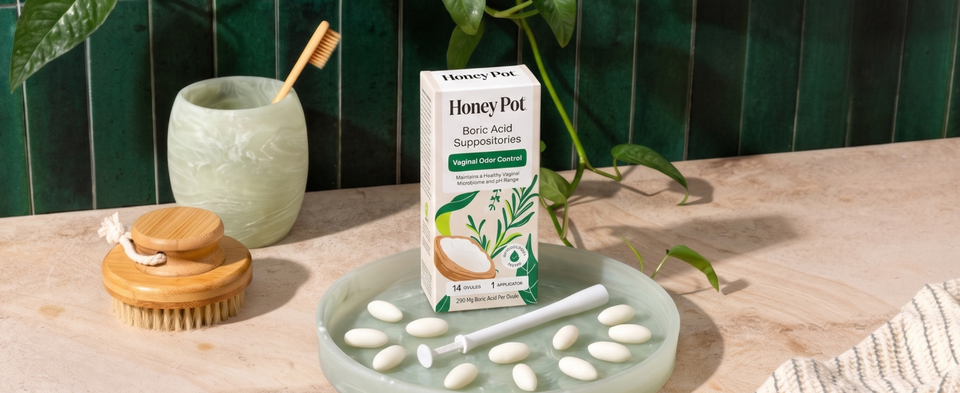 Lifestyle image of Boric Acid Suppositories on a bathroom counter