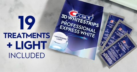 19 Treatments + Light Included. Pack of Crest 3DWhitestrips Professional Express White + Light next to 3 sachets on a marble counter
