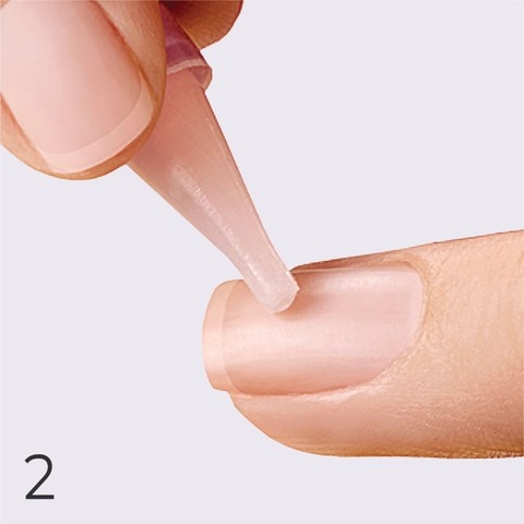 2. Apply glue to your natural nail.