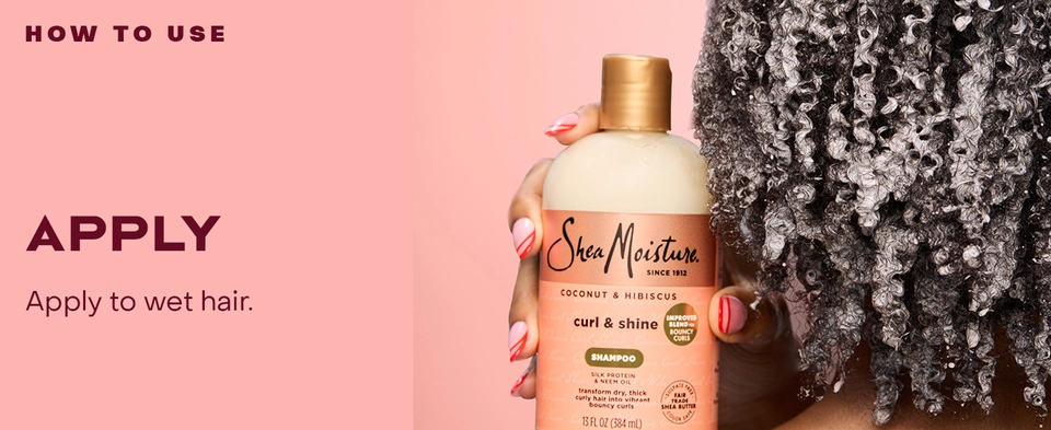 Image of a woman's hand holding a Curly &amp; Shine Shampoo bottle, next to applying instructions.