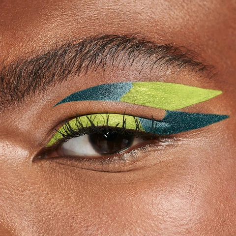 Model with eyeliner look utilizing 24/7 Inks colors  Freak and Deep End a light green and darker blue