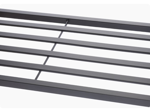 slat shelf of the gray shoe bench