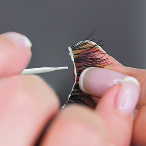 Apply adhesive to lash band