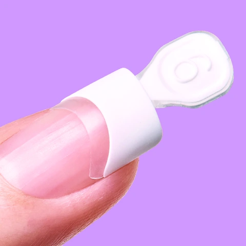 2. Place acrylic where the nail meets the overlay &amp; allow to harden.