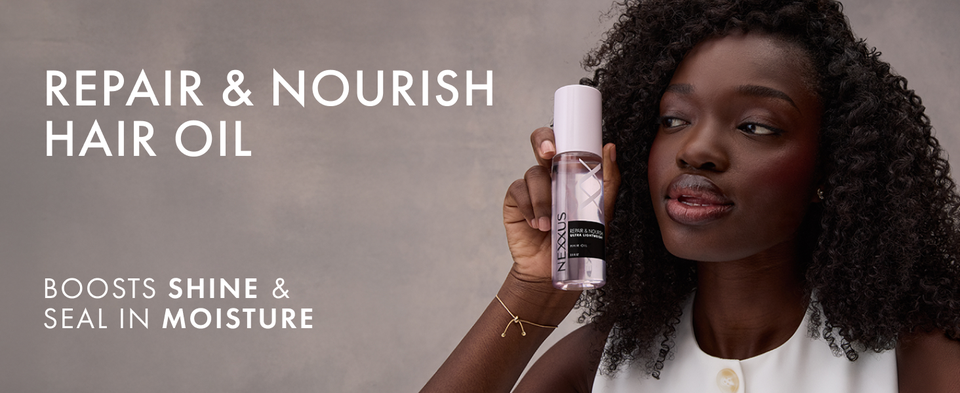 Woman with curly hair holding a hair oil bottle next to text highlighting product benefits.