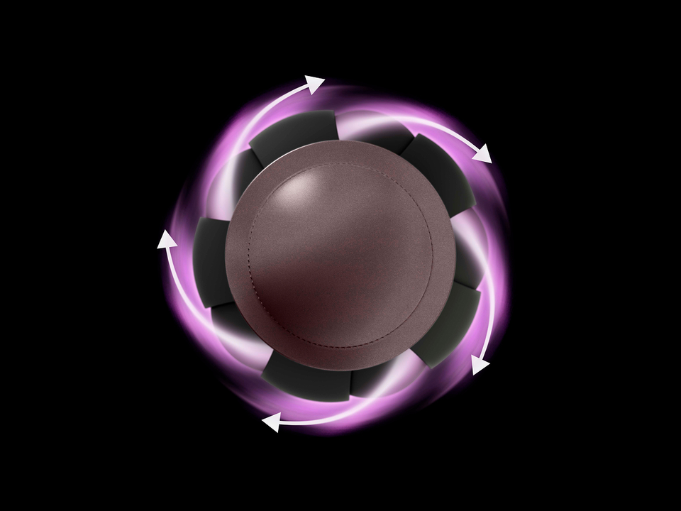 Graphics showing the Coanda airflow around the barrel of a Dyson Airwrap device.