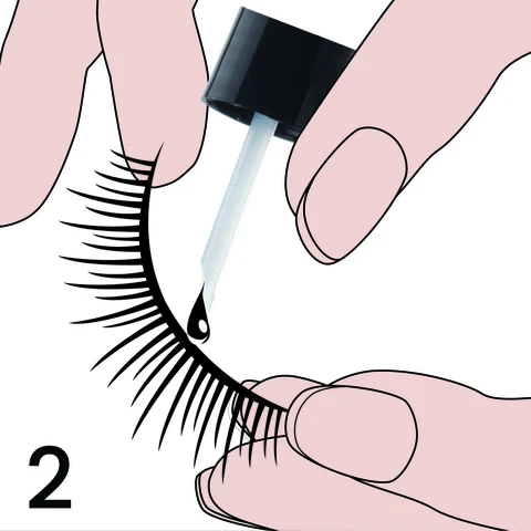 2. Apply KISS Lash Adhesive along lash band.