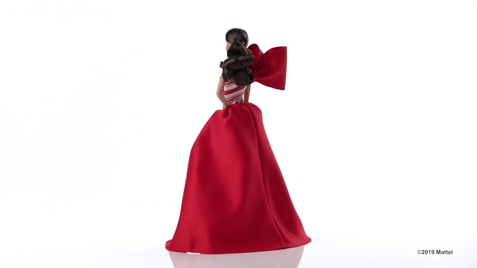 thumbnail video image 2 of Barbie 2019 Holiday Doll, Brunette Side Ponytail with Red & White Gown, 2 of 8