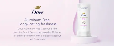 Dove Aluminum Free deodorant in Coconut &amp; Pink Jasmine scent, set on a soft pink background.