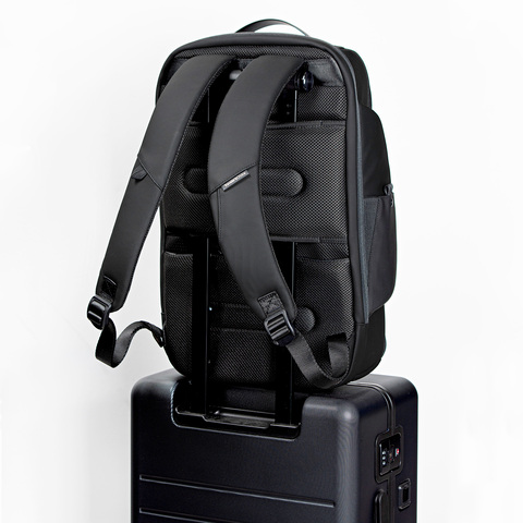 breenon backpack in black with a large airflow backing with a padded luggage loop