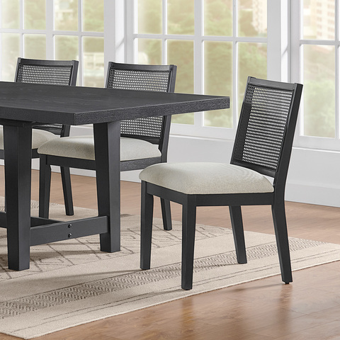 Feature image of the chair angled toward the user, positioned near the end of the table.