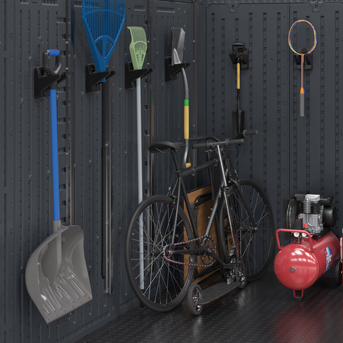 Tools hanging on hooks in shed