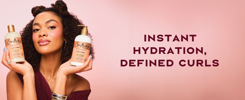 Image of a young woman with curly hair and buns, next to text: instant hydration, defined curls.