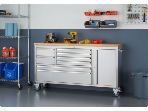 medium size stainless steel workbench in a garage