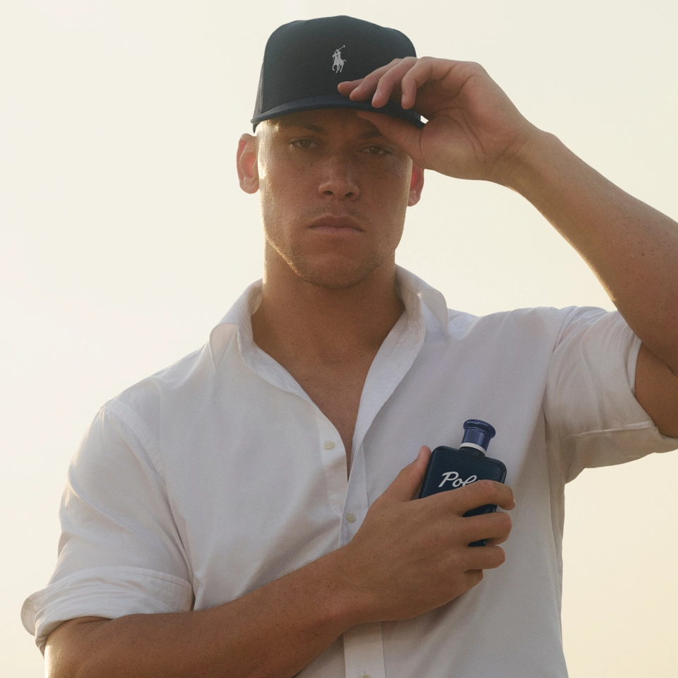 Aaron Judge holding the new Polo 67 Eau de Toilette