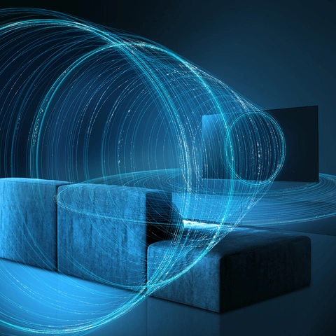 couch with sound waves coming toward it