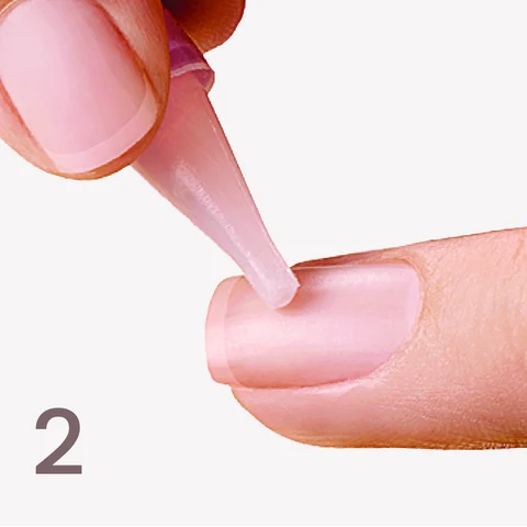 2. Apply glue to your natural nail.