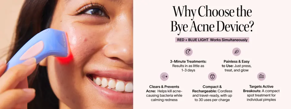 Model using a blue and red light therapy device on a facial blemish.