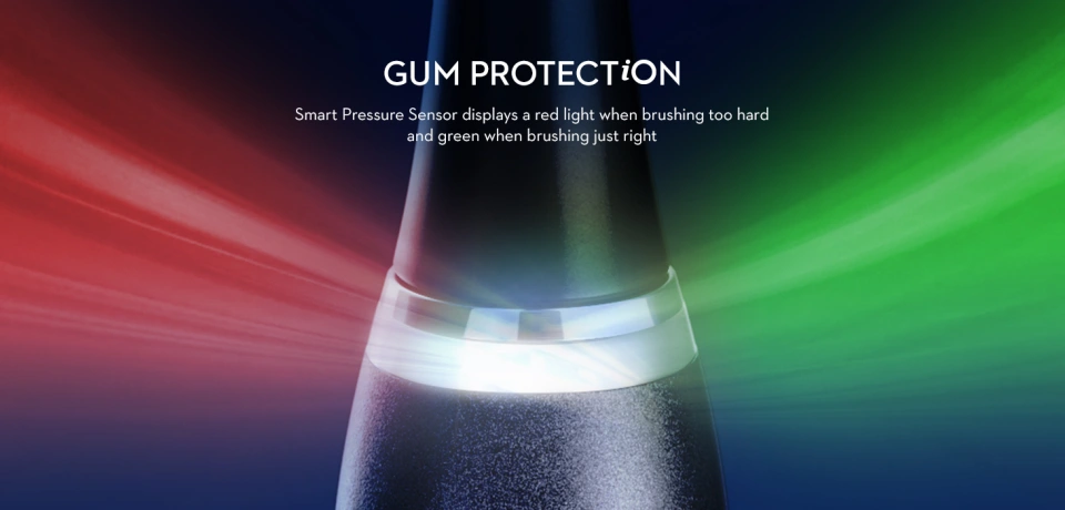 Smart pressure sensor displays a red light when brushing too hard and a green when brushing is just right