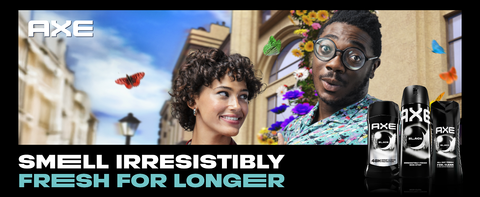 AXE body sprays upfront with a man &amp; woman in city with colorful butterflies &amp; flowers behind them.