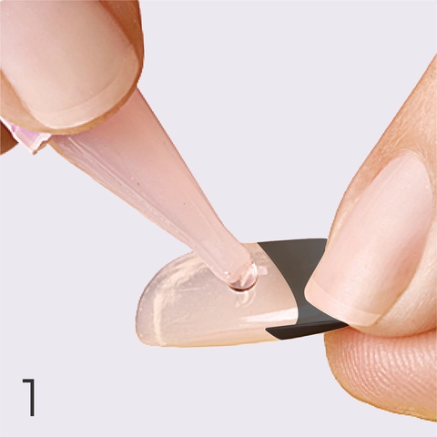 1. Apply glue to the back of artificial nail.