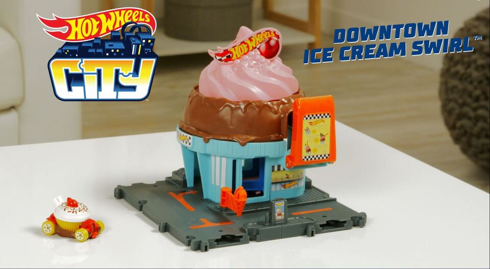 thumbnail video image 2 of Hot Wheels City Downtown Ice Cream Swirl Playset from the series "Let's Race" with 1 Toy Car, 2 of 7