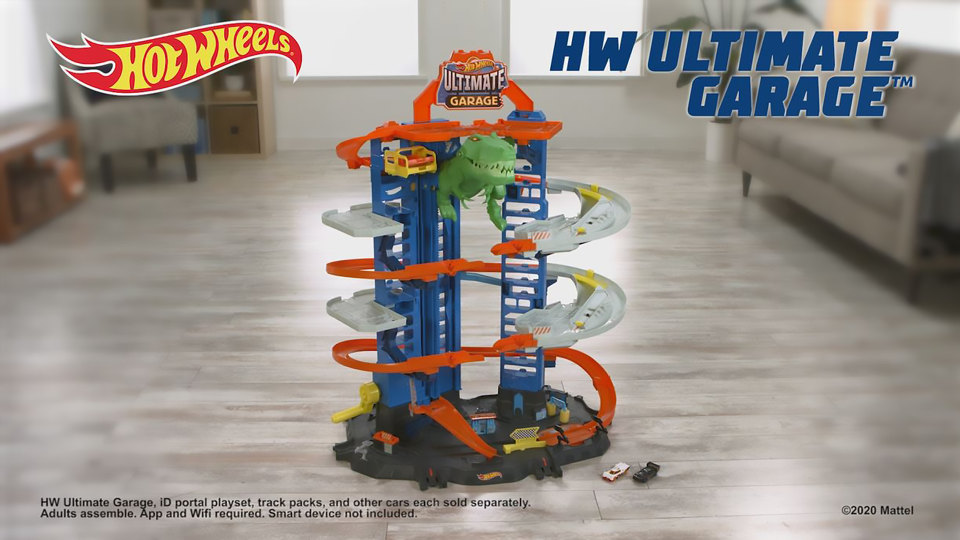 thumbnail video image 2 of Hot Wheels HW Ultimate Garage Playset with 2 Toy Cars, Stores 100+ 1:64 Scale Vehicles, 2 of 7