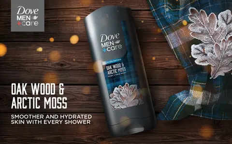 Image of Dove Men+Care Oakwood &amp; Artctic Moss BODY WASH against wooden background.