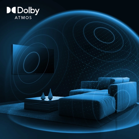 dark room with couch and encompassing sound wave