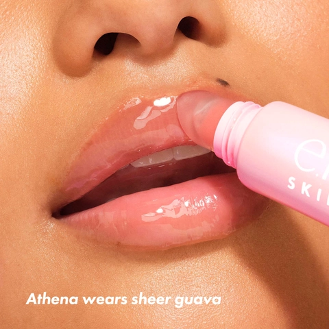 Shade sheer guava on model