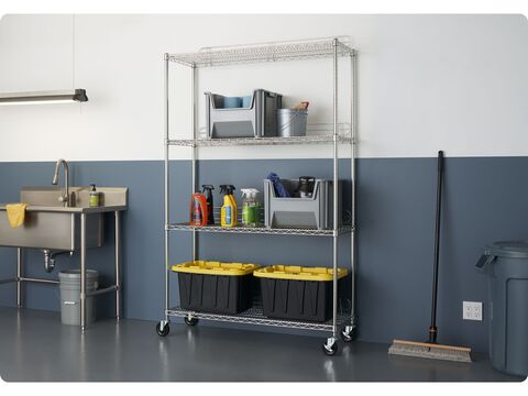 shelving rack filled with tote boxes, in a home garage