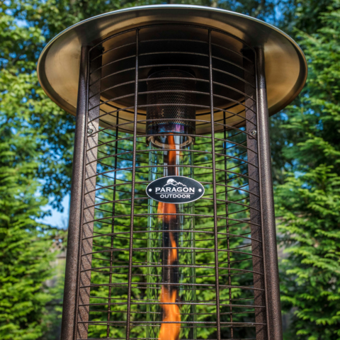 Close up of the Paragon Outdoor Illume Heater with visible flame and logo.