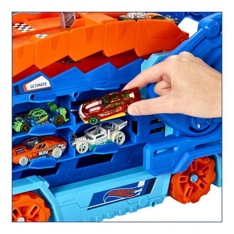 Der Hot Wheels City Ultimative Transporter verwandelt sich in einen T-Rex  mit Rennstrecke, Aufbewahrung von mehr als 20 Autos online bestellen |  MLLER