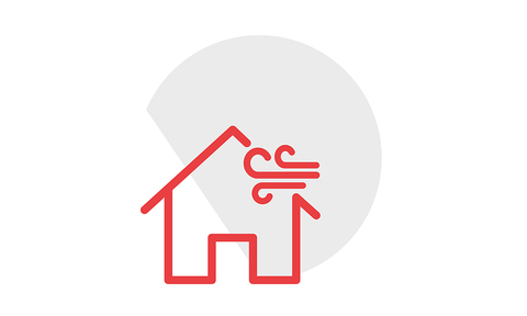 Simple red icon of a house with wind blowing at the roof.