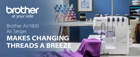 AIR1800 on a table with purple fabric in a sewing room.  Headline:  Brother AIR1800 Air Serger  Subhead in Bold letter: MAKES CHANGING THREADS A BREEZE Logos: Brother At Your Side