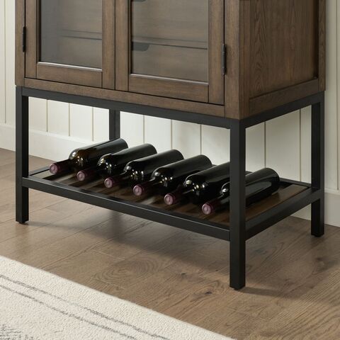 Detail of the lower reversible wine shelf (stores up to six bottles) and powder-coated metal base