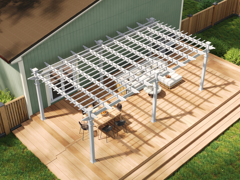 A seating area on a wooden deck underneath a white pergola