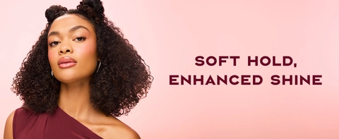 Image of a woman with curly hair, next to text highlighting product's benefits.