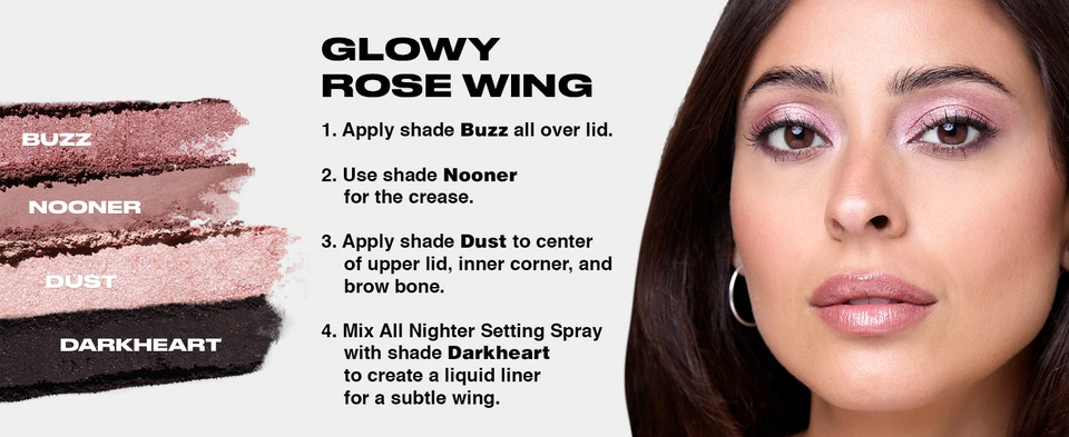 MODEL WITH DARK HAIR SHOWCASING A GLOWY ROSE WING