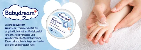 Werbegrafik mit Babydream extra sensitiv Wundschutzcreme Anwendung an Kinderhand und Produktbeschreibung