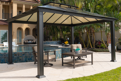 Santa Monica gazebo poolside with outdoor furniture underneath.