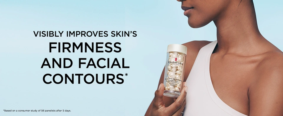 Model holding Elizabeth Arden Hyaluronic Acid + Peptides Ceramide Capsules