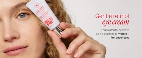 Model holding retinol eye cream for sensitive skin