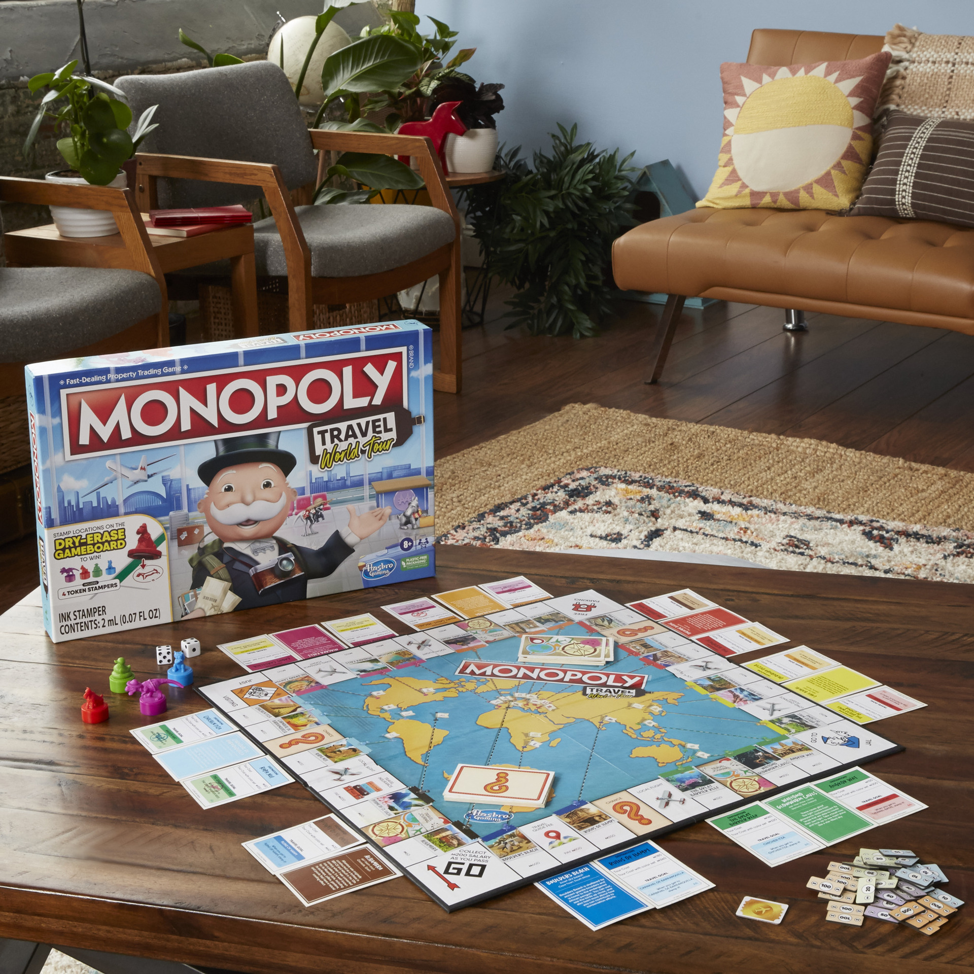 Monopoly Travel World Tour Board Game for Families and Kids Ages 8+,  Includes Token Stampers and Dry-Erase Gameboard - Monopoly